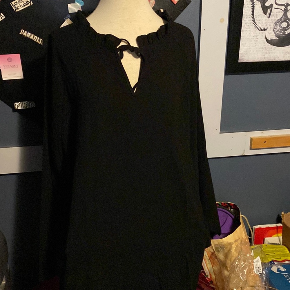 Ruffled neck tunic top
